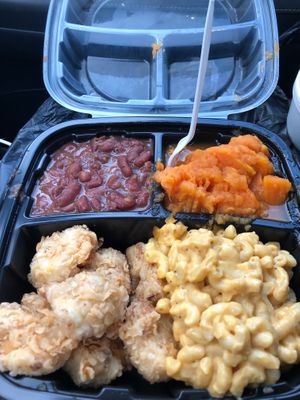 The pick 4 from Sweet Soulfood: fried cauliflower, Mac and cheese, red beans and rice, and sweet potatoes. Delicious.  at Sweet Soulfood in New Orleans