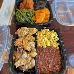 Four items on my plate: mac&cheese, red beans, cauliflower wings, and bread pudding  at Sweet Soulfood in New Orleans