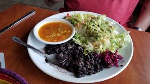 The hubs burrito is buried somewhere in there but it was great!! at Tequila Blue Agave in Lincoln City