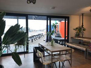 View of entrance from inside restaurant  at Dr Legumes in Folkestone