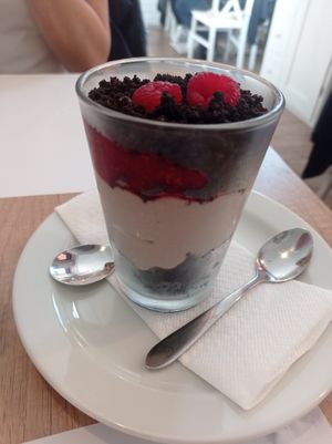 Vegan dessert - chocolate-coconut foam with crumbled brownies and raspberries at Ctyri Sestry in Kutna Hora