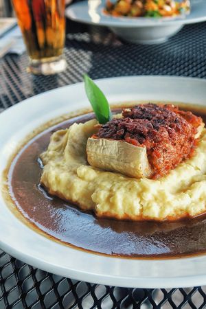 Lentils with tempeh and dried tomatoes in zucchini with potato mash at Ctyri Sestry in Kutna Hora