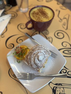 Vegan cinnamon roll and golden milk latte (oat milk)  at Simon's Coffee House in Sarasota