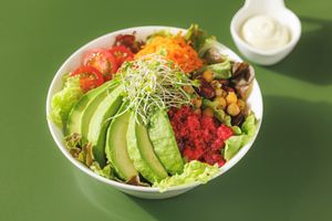 Avocado salad bowl — generously topped with Japanese organic avocado, sprouts, chickpeas, tomatoes & beet quinoa. Served with house-made dressing. Fully vegan & gluten-free. at L for You in Tokyo