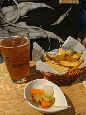 Green tea ale, hand cut french fries, and pickles at Kyoto Beer Lab in Kyoto