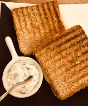 Ham and cheese toastie with garlic and dill sauce at Vegano Cafe in Krakow