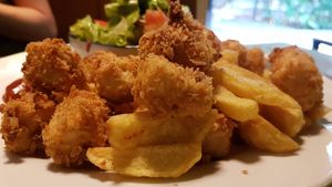 Tofu Nuggets with fries and salad. 3,50$. more info at www.the-vegan-travelers.com at Monkey Republic in Kampot