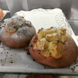 Vegan version of "arrufada" or "pão de Deus". Tipical Portuguese cake with coconut.  at A Vegana in Portimao