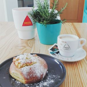 Vegan "arrufada" and vegan "meia de leite" (portuguese milk with coffee)  at A Vegana in Portimao