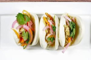 Vegan Bao Sliders

King oyster mushrooms, carrots, daikon, cabbage, leek, tofu stuffed into steamed bao bun. at Dundas in Vancouver