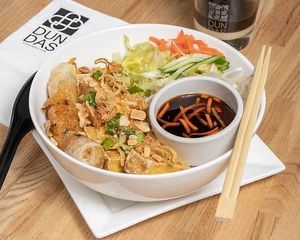 Vegan Vermicelli

Vermicelli noodles with bean sprouts, basil, cucumbers, lettuce, daikon, carrots, vegan spring roll, tofu topped with crushed peanuts, fried onions, green onions  at Dundas in Vancouver