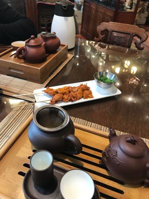 Ginseng oolong tea and  ‘chicken’ skewers  at Ming Tao Xuan in Montreal