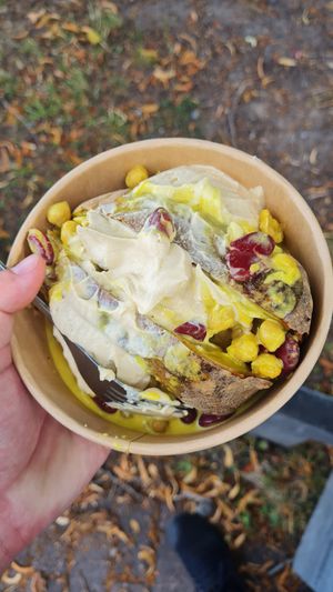 Baked potato with hummus and bean curry. Tasty! at Atmajala in Norrtalje