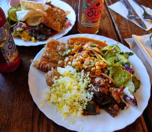 Plates with dishes from the buffet at Hermans in Stockholm