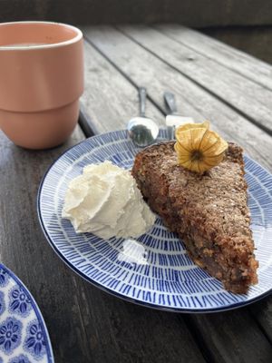Walnut & parsnip cake with some whipped cream   at Hermans in Stockholm