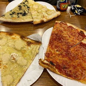 vegan white pizza and vegan regular at NY Pizza Suprema in New York City