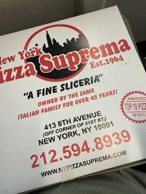 They wrapped up my three slices nicely! at NY Pizza Suprema in New York City