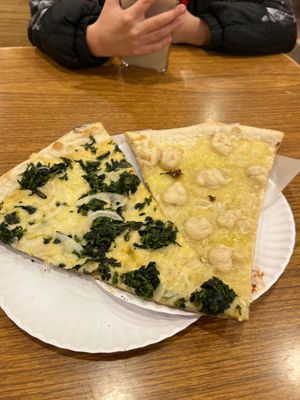 Vegan white and one with spinach  at NY Pizza Suprema in New York City