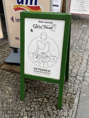 Street sign (the restaurant is away from the street through an arch)  at Good Morning Vietnam Vegan in Berlin