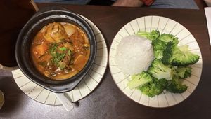 Dau Kyo comes with rice & broccoli on side. It is stew in the clay pot hot boiling. The stuffed tofu was very nice even though the stew itself was too sweet.   at Good Morning Vietnam Vegan in Berlin