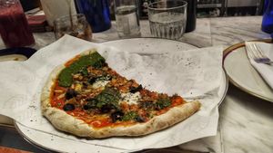 Pizza individual at Casa Lėlytė in Bogota