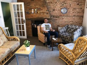 Daniel enjoying the layout of the cafe very comfy  at Okomoko in Farnham