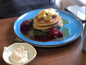 Vegan pancakes with coconut cream  at Okomoko in Farnham
