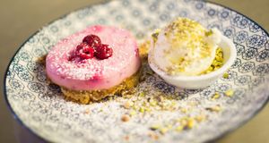 Vegan lemon and raspberry cheesecake at Gandhi's Cafe in Ambleside