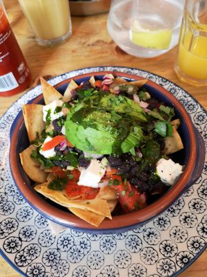Chilaquiles for breakfast, delicious! at Gandhi's Cafe in Ambleside