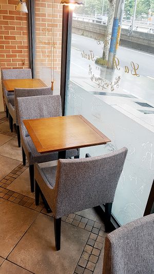 Interior of location, seating area towards main street at La Bonne Tarte in Seoul