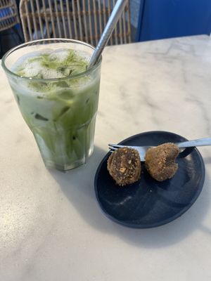 Iced matcha latte with oat milk, vegan protein balls   at The Social Space - Chinatown in Central Singapore