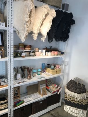 Ethical merchandise - assortment of straws and straw brushes at The Social Space - Chinatown in Central Singapore