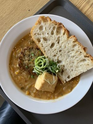 patato-pumpkin stew, served with tofu and veggie patty  at Dvanast Dusi in Bratislava