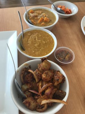 Vegan sides. Deviled potatoes, Dahl, squash curry, carrot pickles at Serendib in Ellsworth