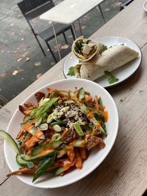 Korean loaded sweet potato fries😋 🌶️🌶️ and adonis wrap😋  at BACKYARD in Rotterdam