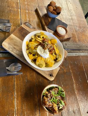 Nachos, bitterballen, cauliflower wings🩵  at BACKYARD in Rotterdam