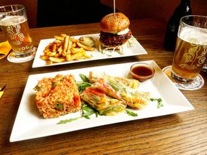 Vegan risotto and spring rolls. Burger is vegetarian, not vegan. at Pivohram Golar in Gornja Radgona