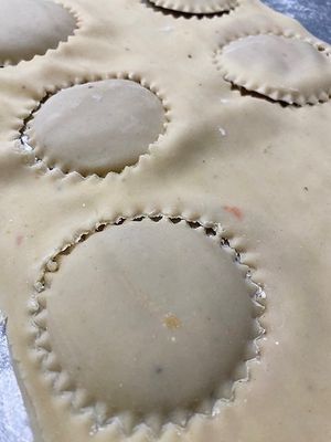 sellgmacht" unser veganen Allgäuer Schlutzkrapfen im Wurzelgemüsesud und feinen Alpenkräutern mit veganem Mandelkäse! at Naturlandhaus Krone in Maierhoefen