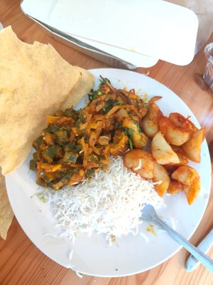 Karahi bhindi, adraki gobi, boiled rice,masala chips and poppadoms at Zeera in South Shields