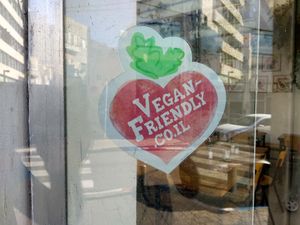 Vegan-Friendly.co.il sign on door of Garger Hazahav at Garger Hazahav in Tel Aviv