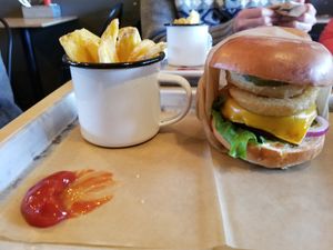 Vegan burger (black bean patty that doesnt fall apart, onion rings, violife cheese and other fixins) at Smiðjan Brugghús in Vik
