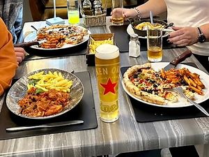 Vegan pizza, vegan lasagna, vegan chicken dish  at Carlucci Restaurant in Dunfermline