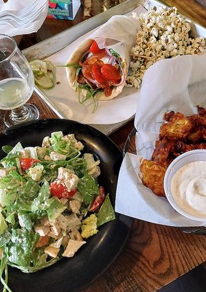 Caesar salad with chicken, buffalo cauliflower, and gyro with meatloaf strips at Root Down Brewing Company in Phoenixville