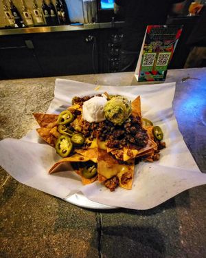 Loaded Nachos with Vegan Queso, Vegan Sour Cream, and Impossible Meat at Root Down Brewing Company in Phoenixville