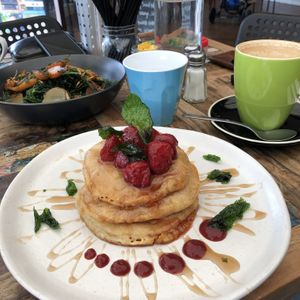 Strawberry pancakes and vegan roasted veg. Soy flat white. Breakfast of champions.  at Little Clive in Annerley