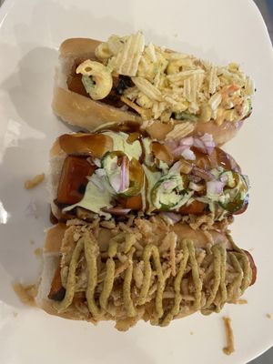 Three dog flight: picnic dog , Maui waui dog, Throwback dog  at Eden Cafe & Bakeshop in Batavia