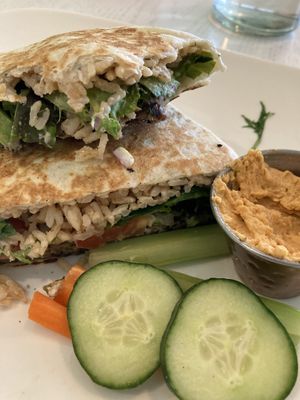 Black bean burger panini wrap, hummus veggie side. Yum! Ask for salsa, even better!  at Eden Cafe & Bakeshop in Batavia