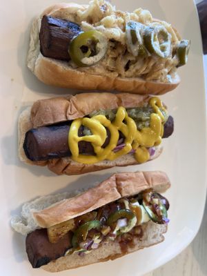 Tried the $15 flight of 3 dogs   at Eden Cafe & Bakeshop in Batavia