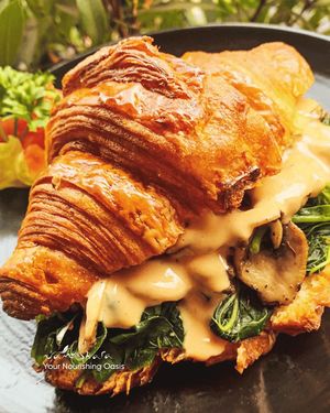We offer croissants with buttery flavor, as well as a variety of delicious vegan-vegetarian fillings to satisfy your cravings, such as Croissant Sandwich. at Namaskara Coffee & Superfoods in Ubud