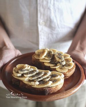 Start your day off right with a delicious and nutritious breakfast! Banana peanut butter on toast from Namaskara is a great option. at Namaskara Coffee & Superfoods in Ubud